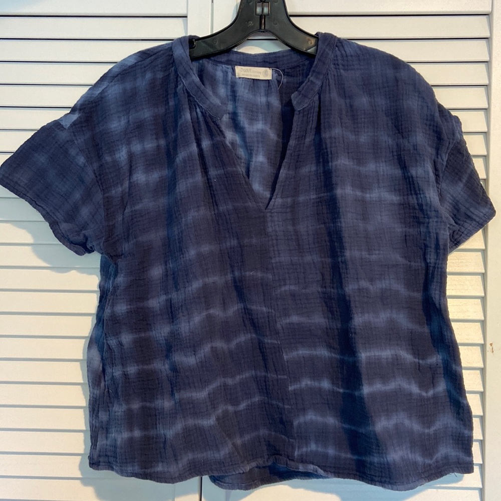 Blue loose shirt with low v neck